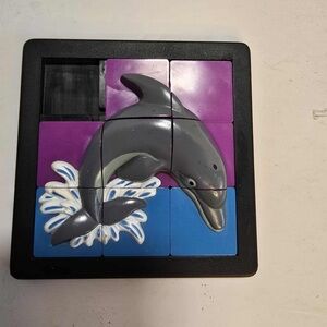 vintage 3D sliding puzzle by Damert dolphin 1990s